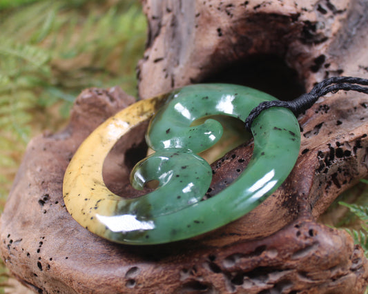Koru Pendant carved from Flower Jade Pounamu - NZ Greenstone
