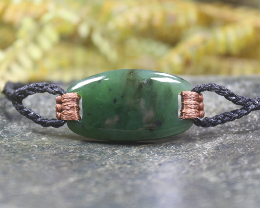 Adjustable cord bracelet with Hapopo Pounamu