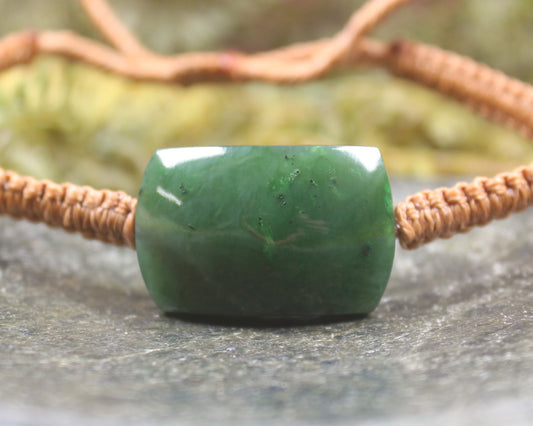 Adjustable cord bracelet with Hapopo Pounamu
