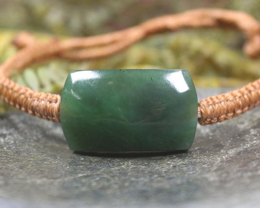 Adjustable cord bracelet with Hapopo Pounamu