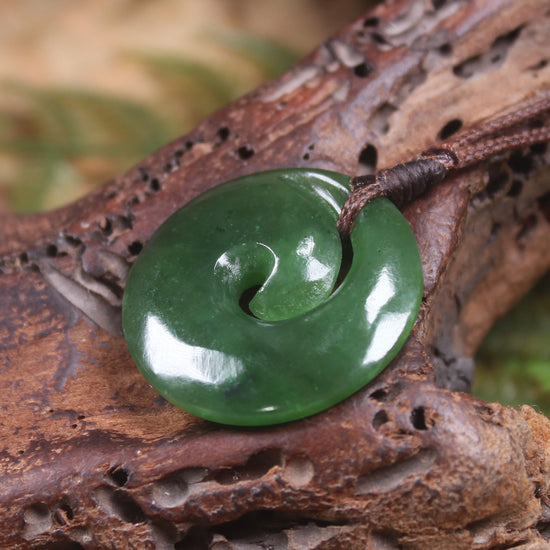 Koru pendant carved from Kawakawa Pounamu - NZ Greenstone