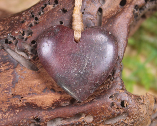 Heart carved from Rhodonite
