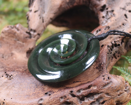 Koru carved from Rimu Pounamu - NZ Greenstone