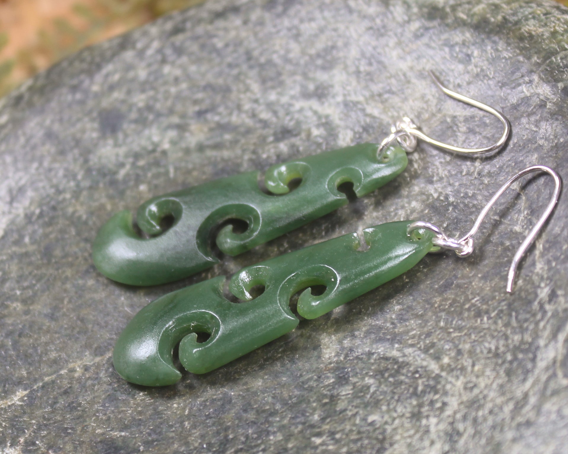 Roimata with Koru earrings carved from Hapopo Pounamu - NZ Greenstone