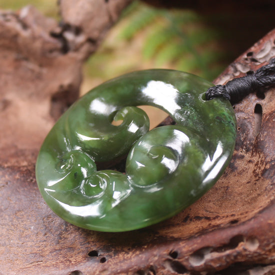 Koru carved from Rimu Pounamu - NZ Greenstone