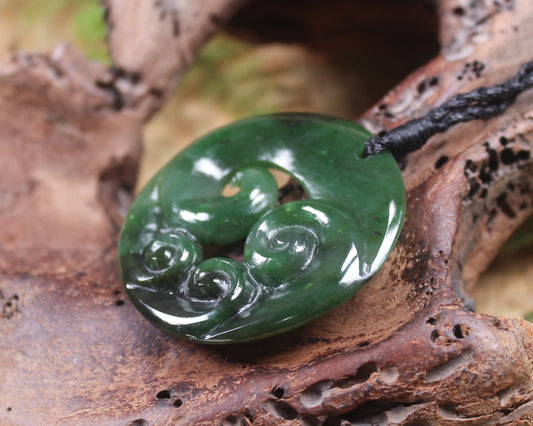 Koru pendant carved from Kawakawa Pounamu - NZ Greenstone