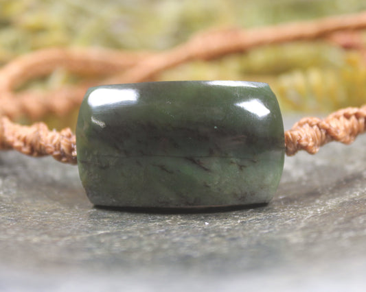 Adjustable cord bracelet with Rimu Pounamu