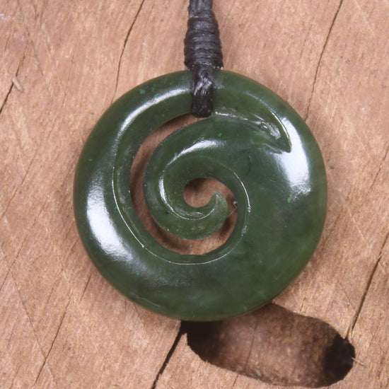 Koru pendant carved from Kawakawa Pounamu - NZ Greenstone