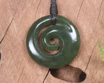 Koru pendant carved from Kawakawa Pounamu - NZ Greenstone