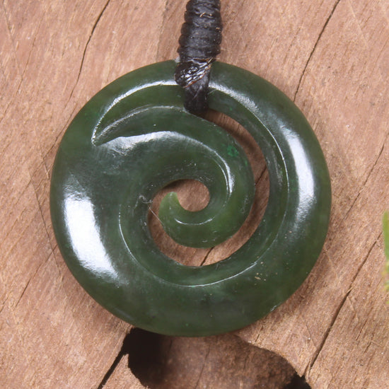 Koru pendant carved from Kawakawa Pounamu - NZ Greenstone