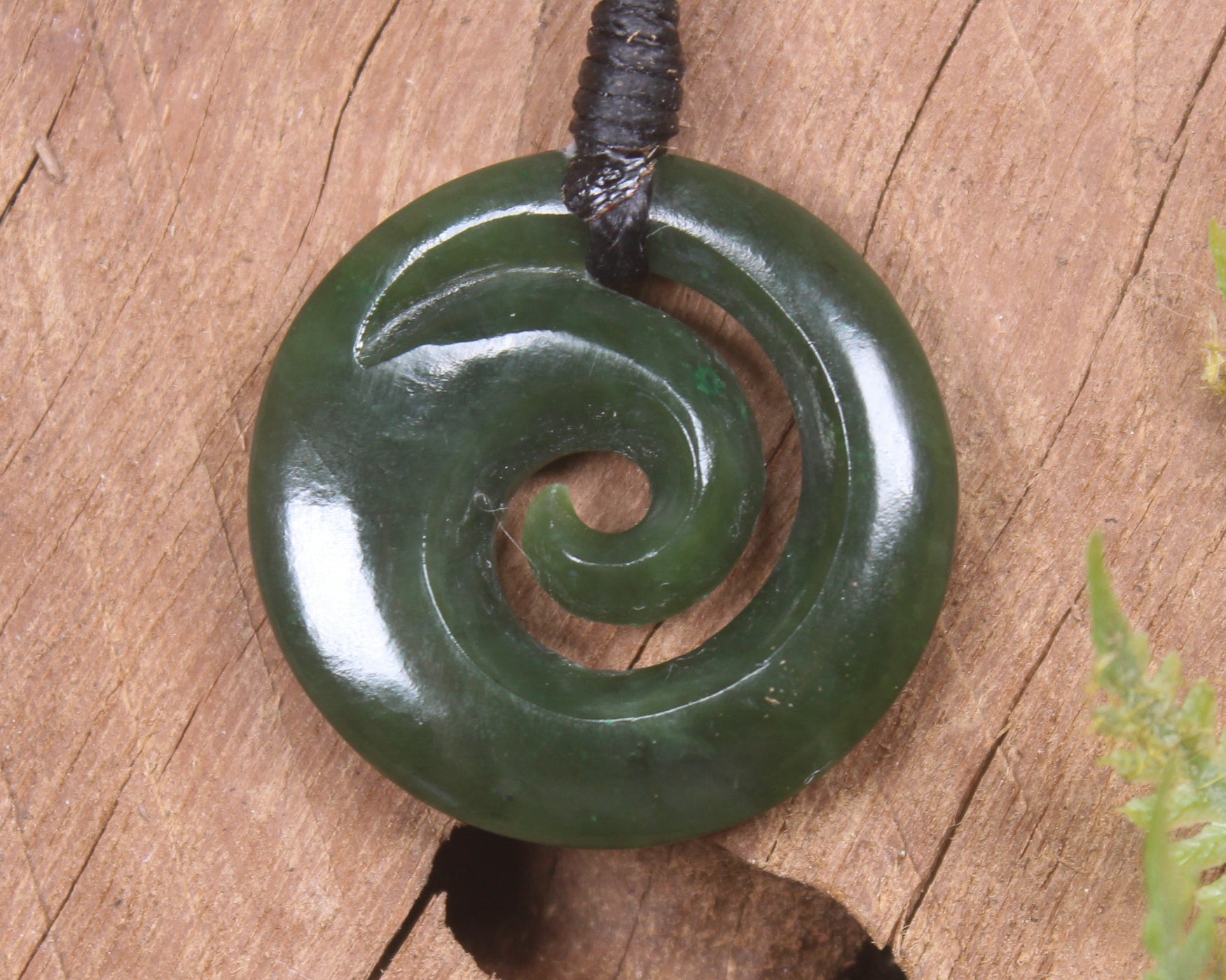 Koru pendant carved from Kawakawa Pounamu - NZ Greenstone