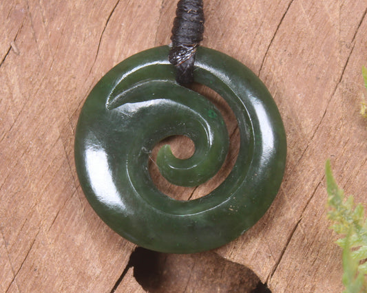 Koru pendant carved from Kawakawa Pounamu - NZ Greenstone