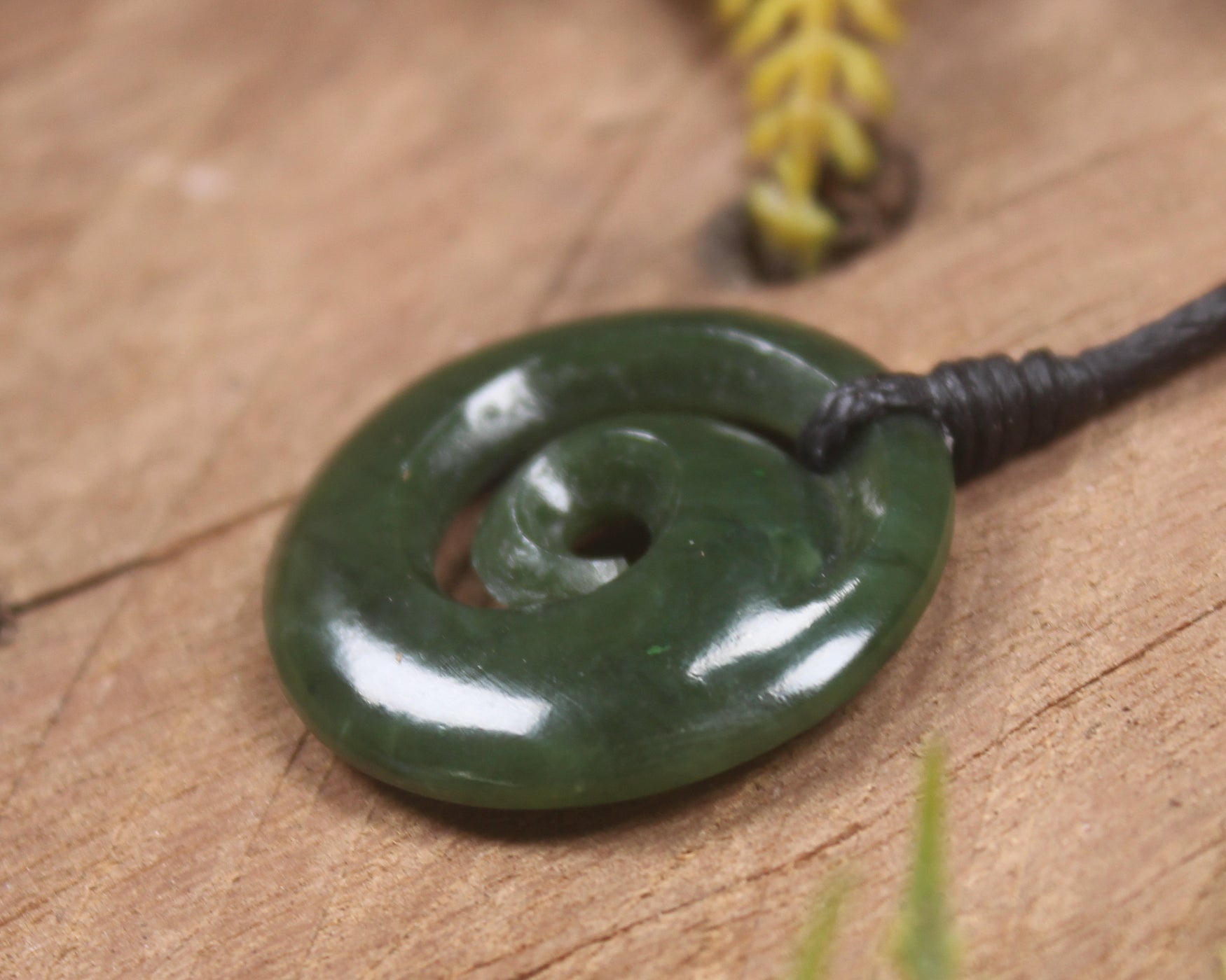 Koru pendant carved from Kawakawa Pounamu - NZ Greenstone