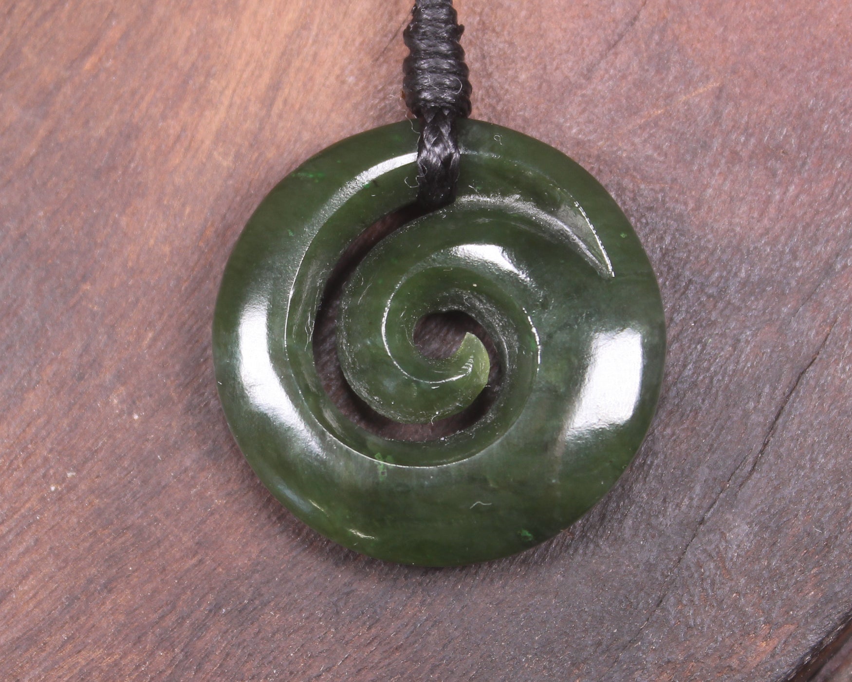 Koru pendant carved from Kawakawa Pounamu - NZ Greenstone