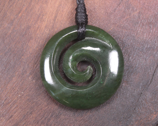 Koru pendant carved from Kawakawa Pounamu - NZ Greenstone