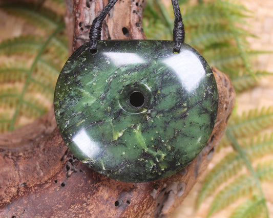 Porowhita carved from Douglas Creek Pounamu - NZ Greenstone