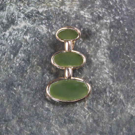 Hapopo Pounamu pendant with a gold plated setting - NZ Greenstone