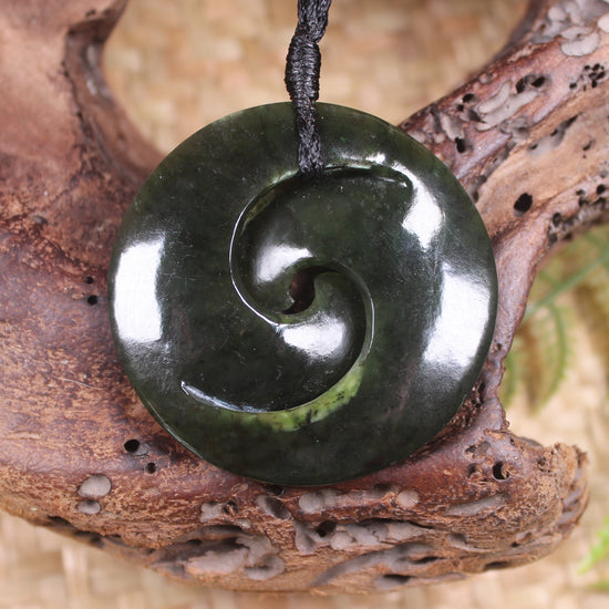 Koru carved from Rimu Pounamu - NZ Greenstone