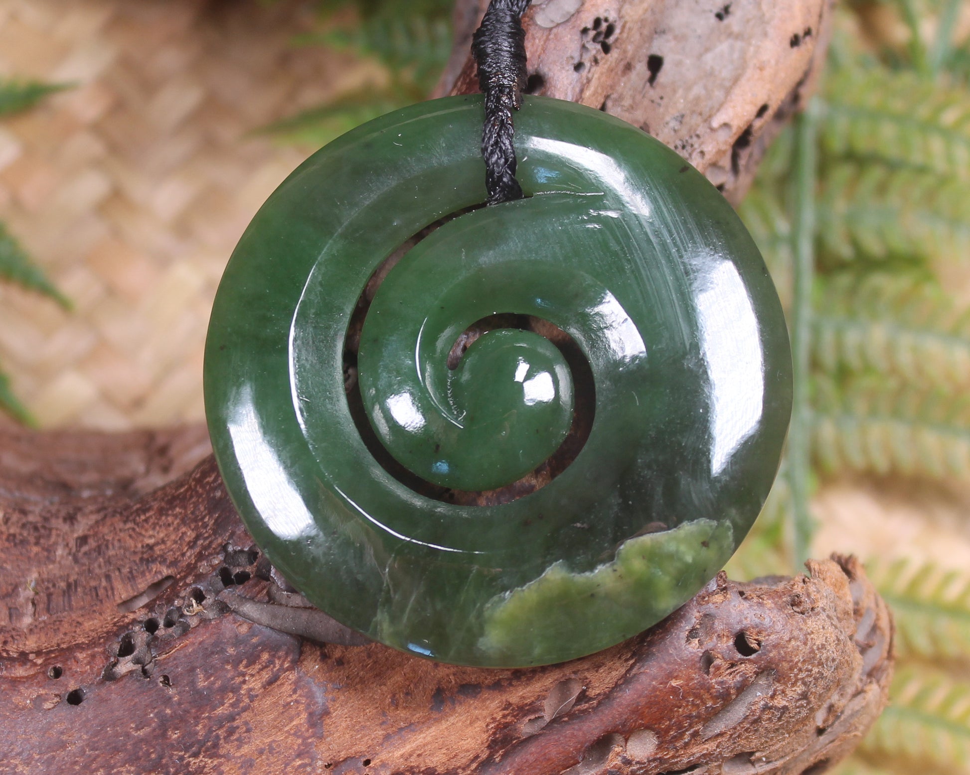 Koru pendant carved from Kawakawa Pounamu - NZ Greenstone