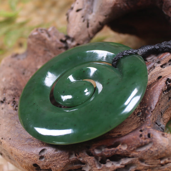 Koru pendant carved from Kawakawa Pounamu - NZ Greenstone