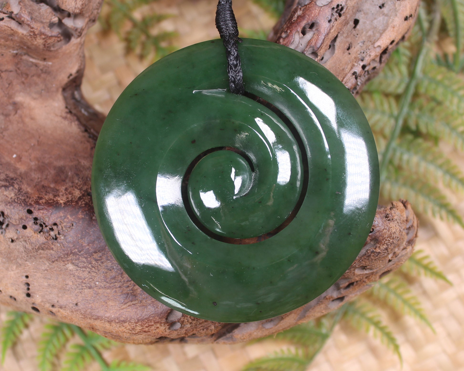Koru pendant carved from Kawakawa Pounamu - NZ Greenstone