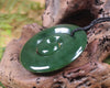 Koru pendant carved from Kawakawa Pounamu - NZ Greenstone