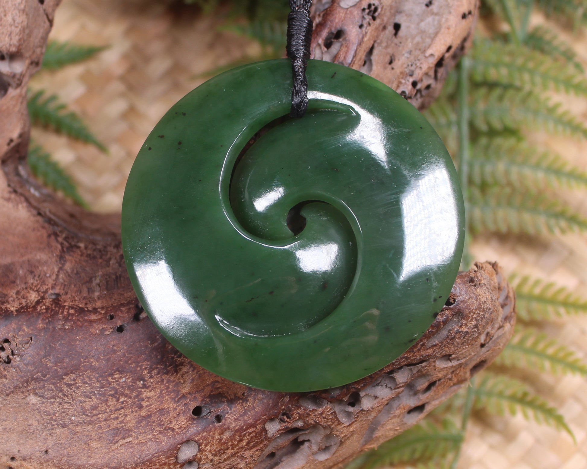 Koru pendant carved from Kawakawa Pounamu - NZ Greenstone