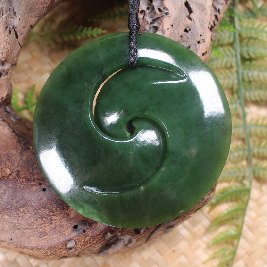 Koru pendant carved from Kawakawa Pounamu - NZ Greenstone