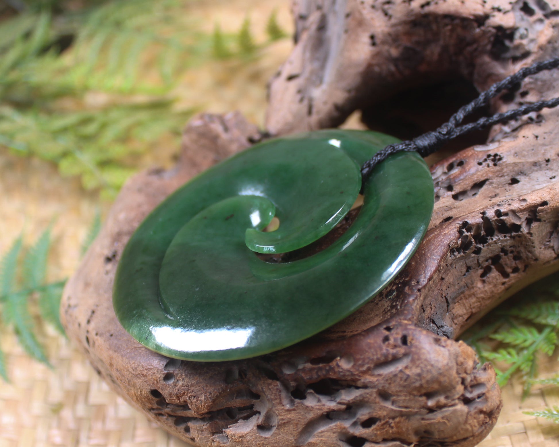 Koru pendant carved from Kawakawa Pounamu - NZ Greenstone