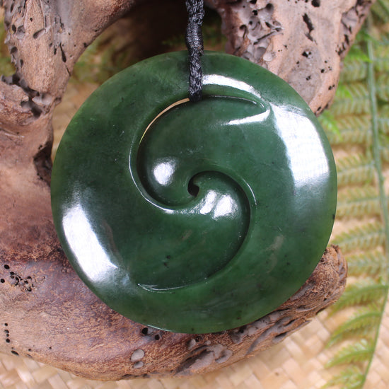 Koru pendant carved from Kawakawa Pounamu - NZ Greenstone
