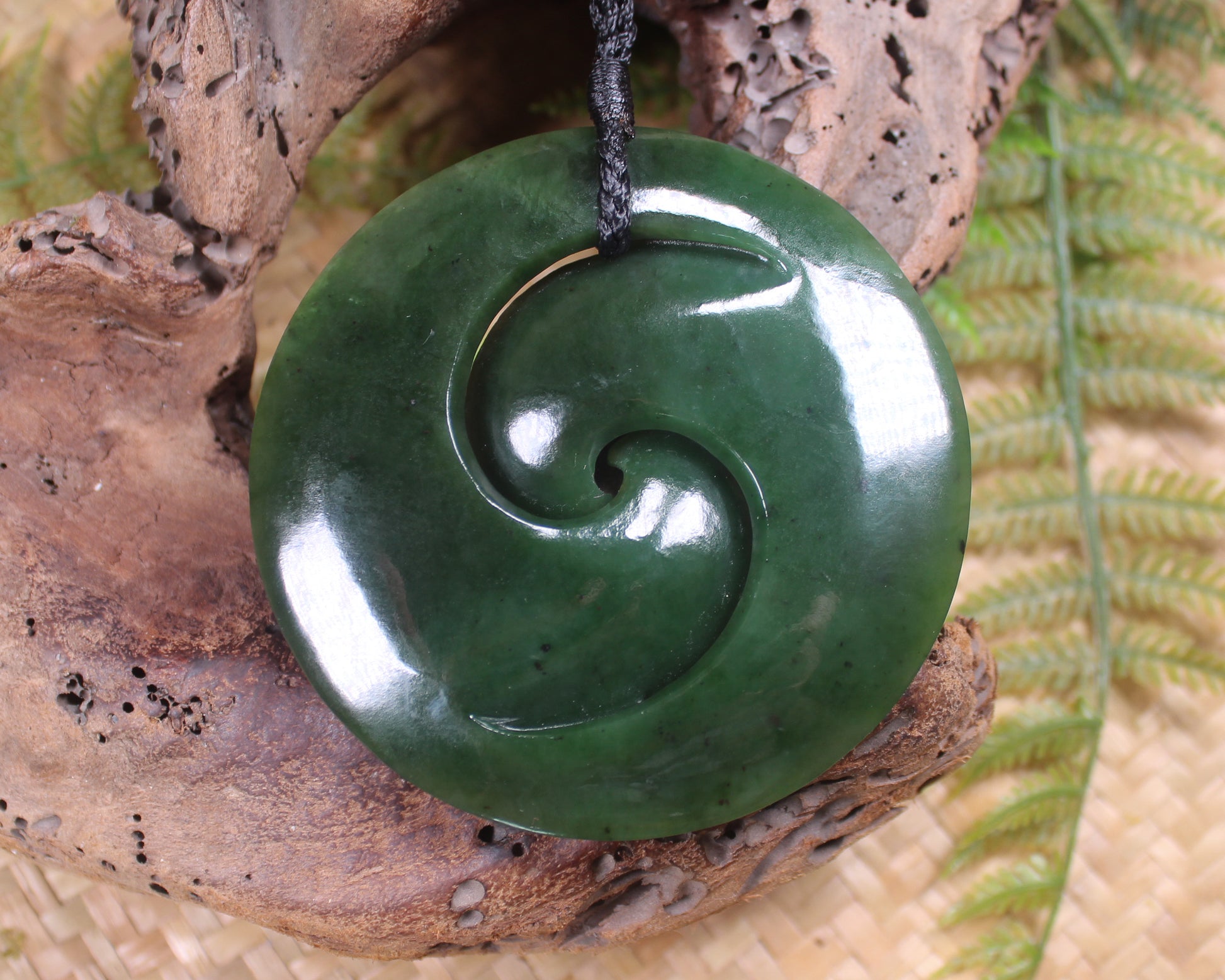 Koru pendant carved from Kawakawa Pounamu - NZ Greenstone