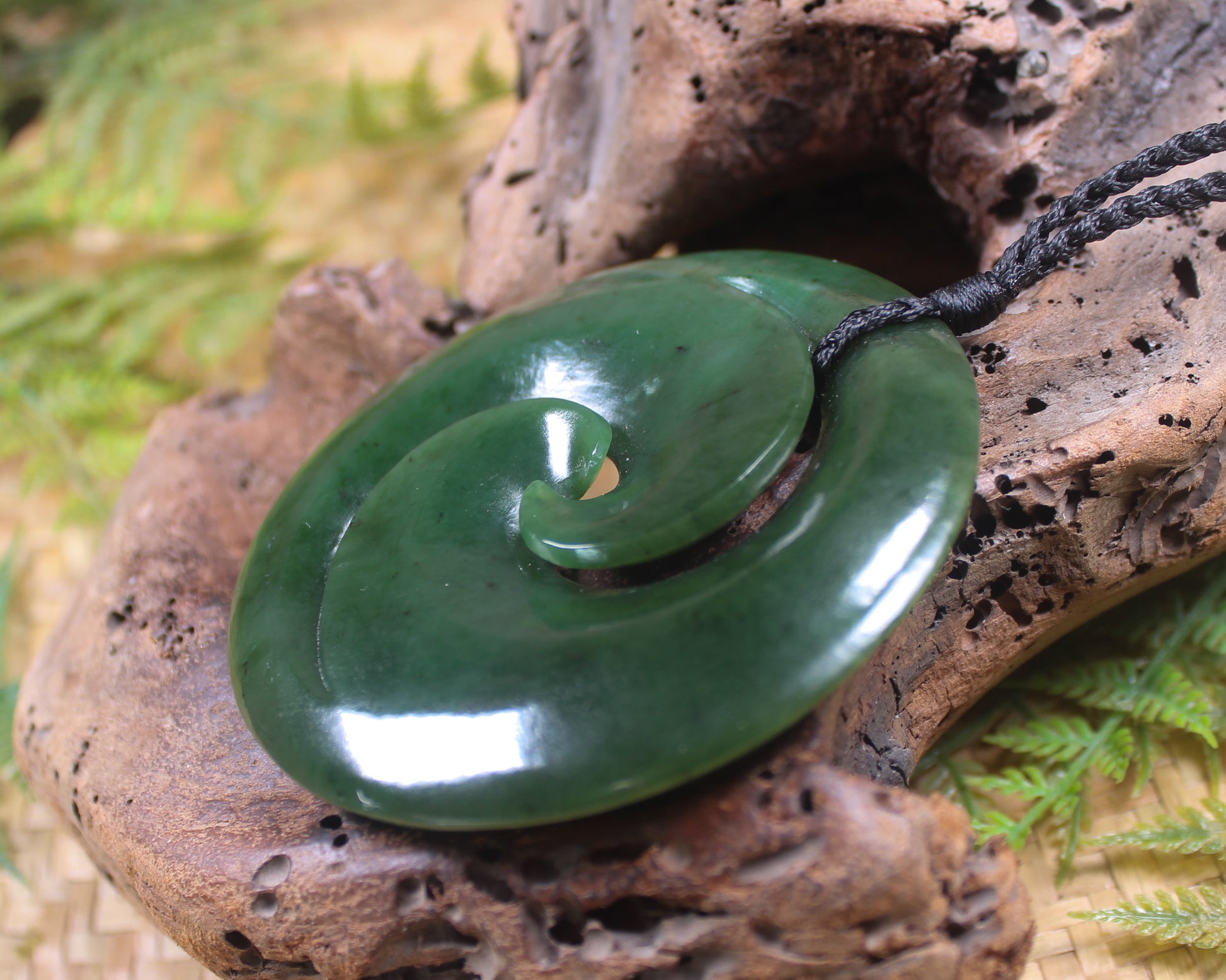 Koru pendant carved from Kawakawa Pounamu - NZ Greenstone