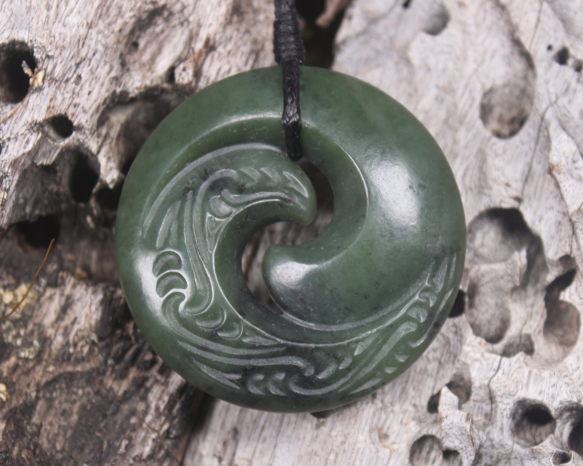 Koru carved from Rimu Pounamu - NZ Greenstone