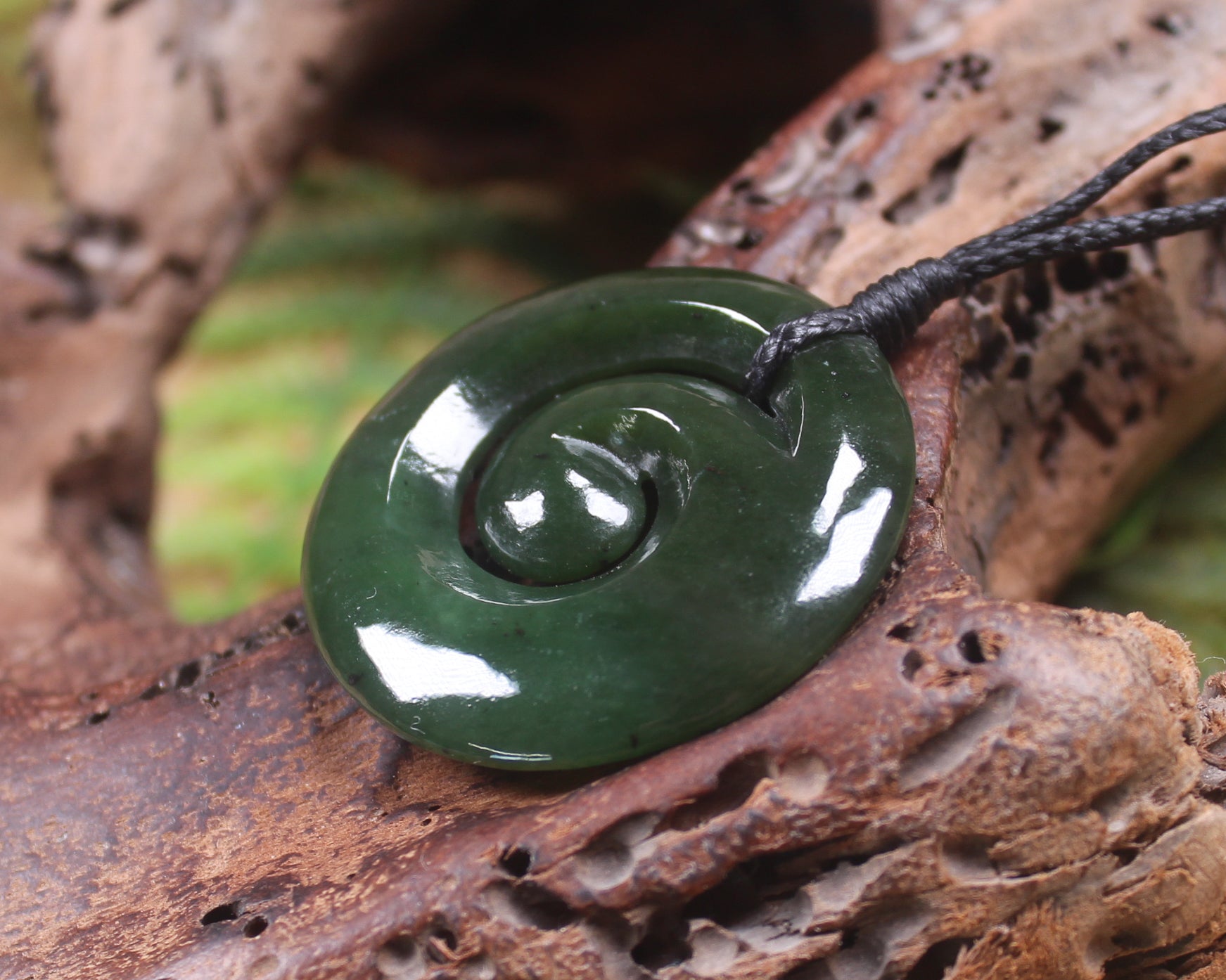 Koru pendant carved from Kawakawa Pounamu - NZ Greenstone