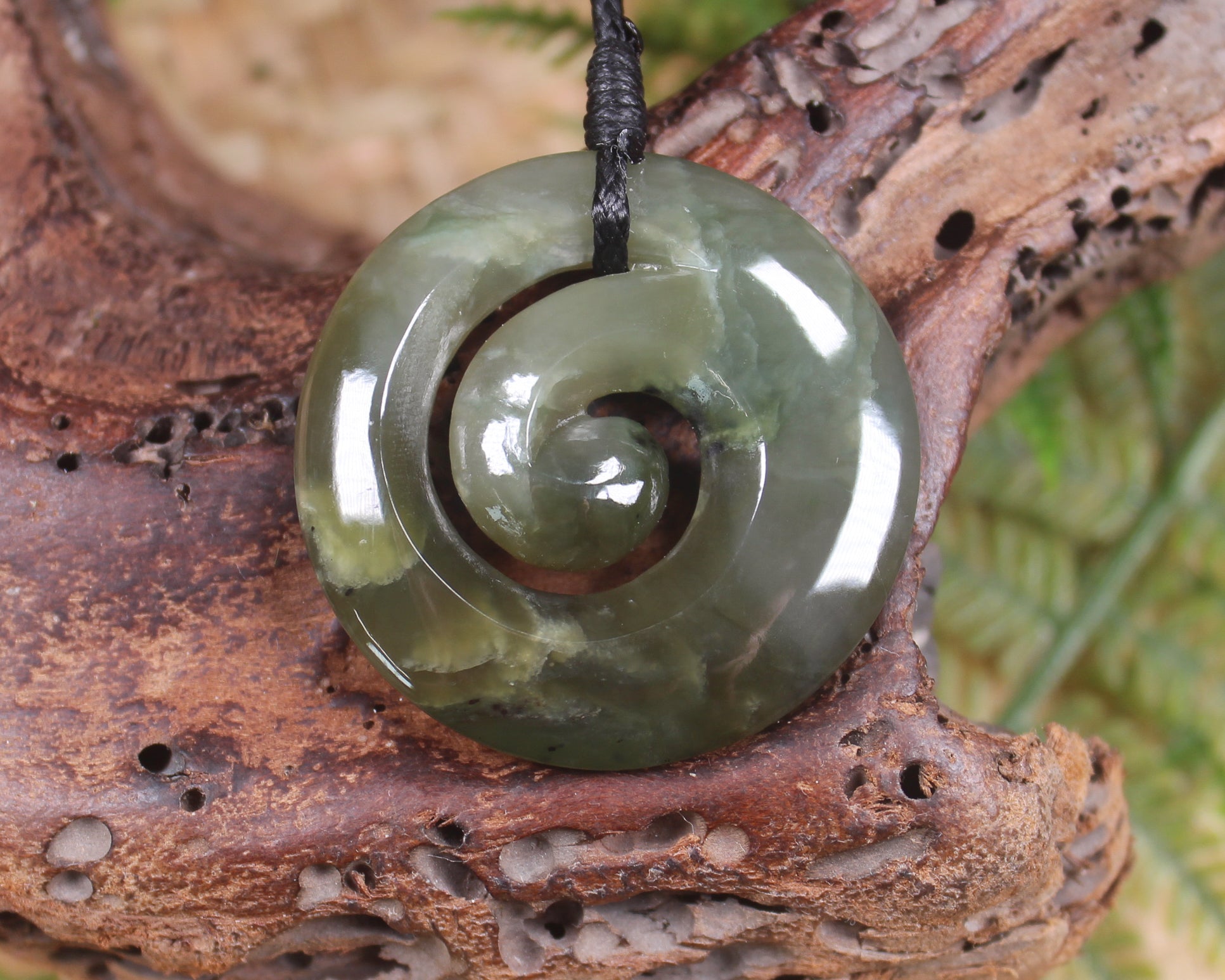 Koru carved from Inanga Pounamu - NZ Greenstone