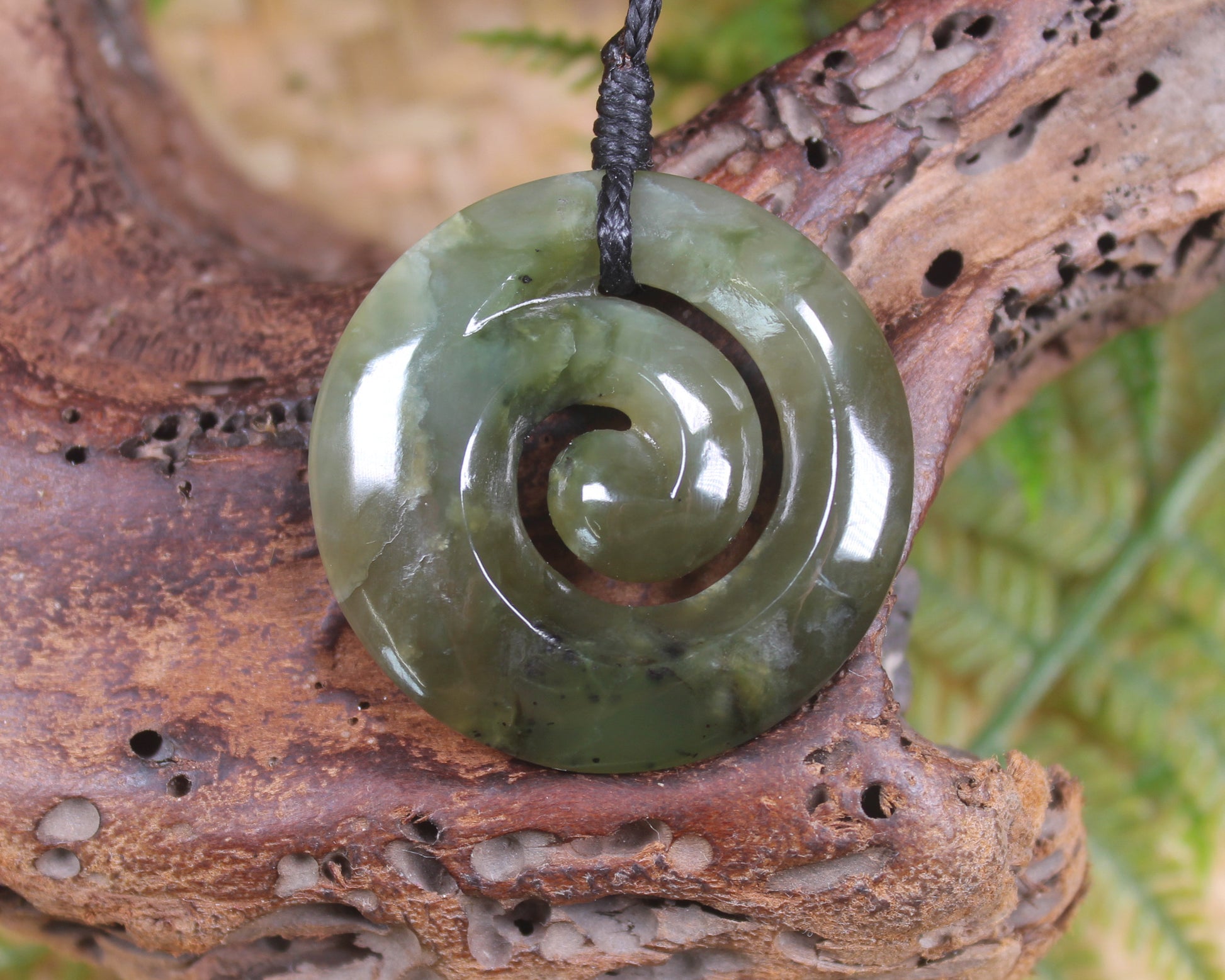 Koru carved from Inanga Pounamu - NZ Greenstone
