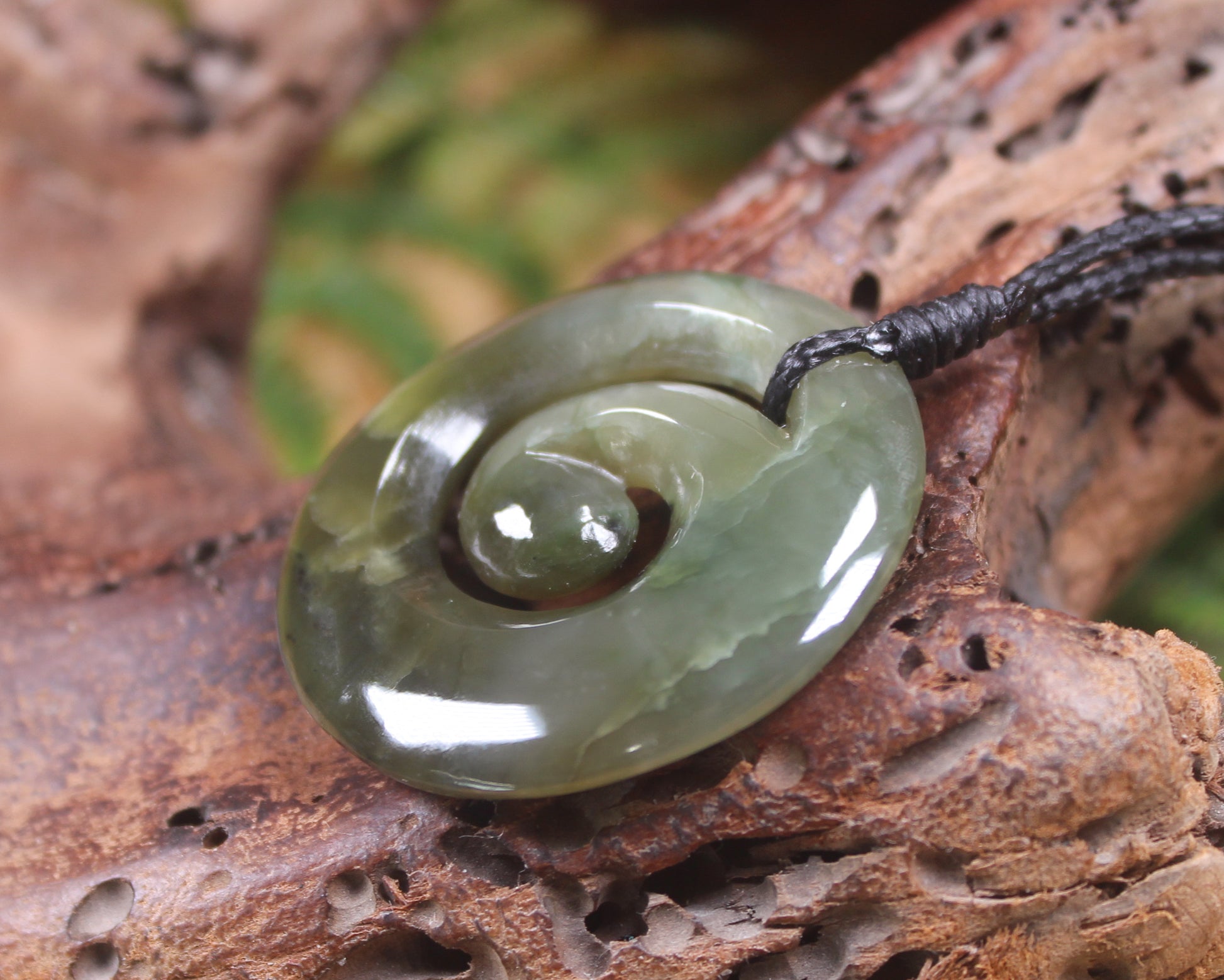 Koru carved from Inanga Pounamu - NZ Greenstone