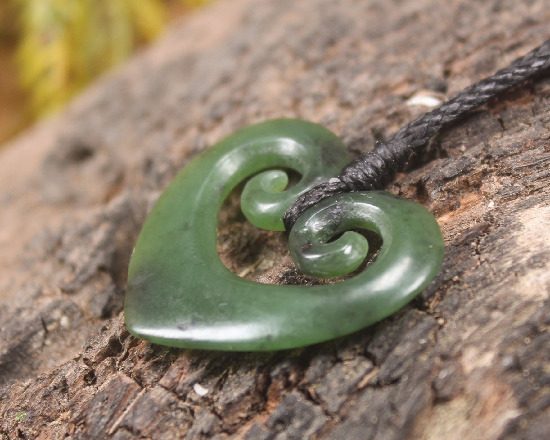 Koru Heart pendant carved from Hapopo Pounamu - NZ Greenstone