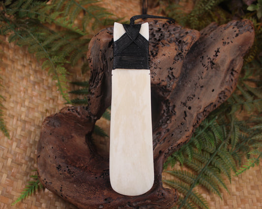 Toki or Adze with Koru carved from Beef Bone