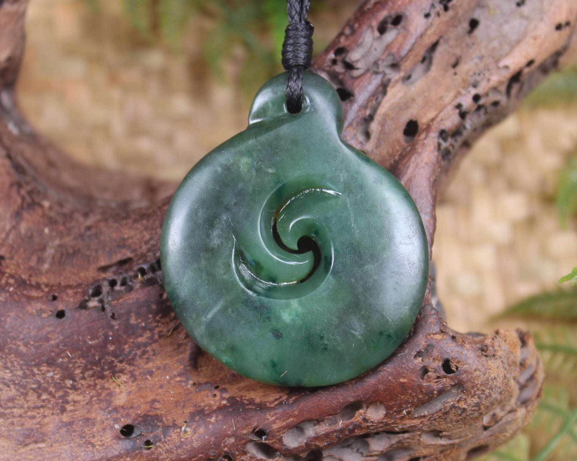 Koru pendant carved from Kawakawa Pounamu - NZ Greenstone