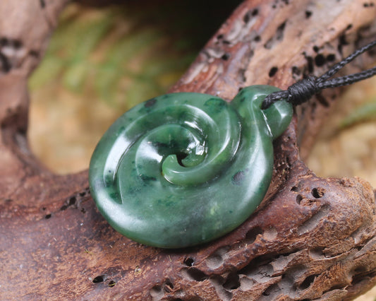 Koru pendant carved from Kawakawa Pounamu - NZ Greenstone