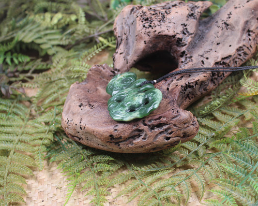 Hei Tiki carved from Flower Jade Pounamu - NZ Greenstone