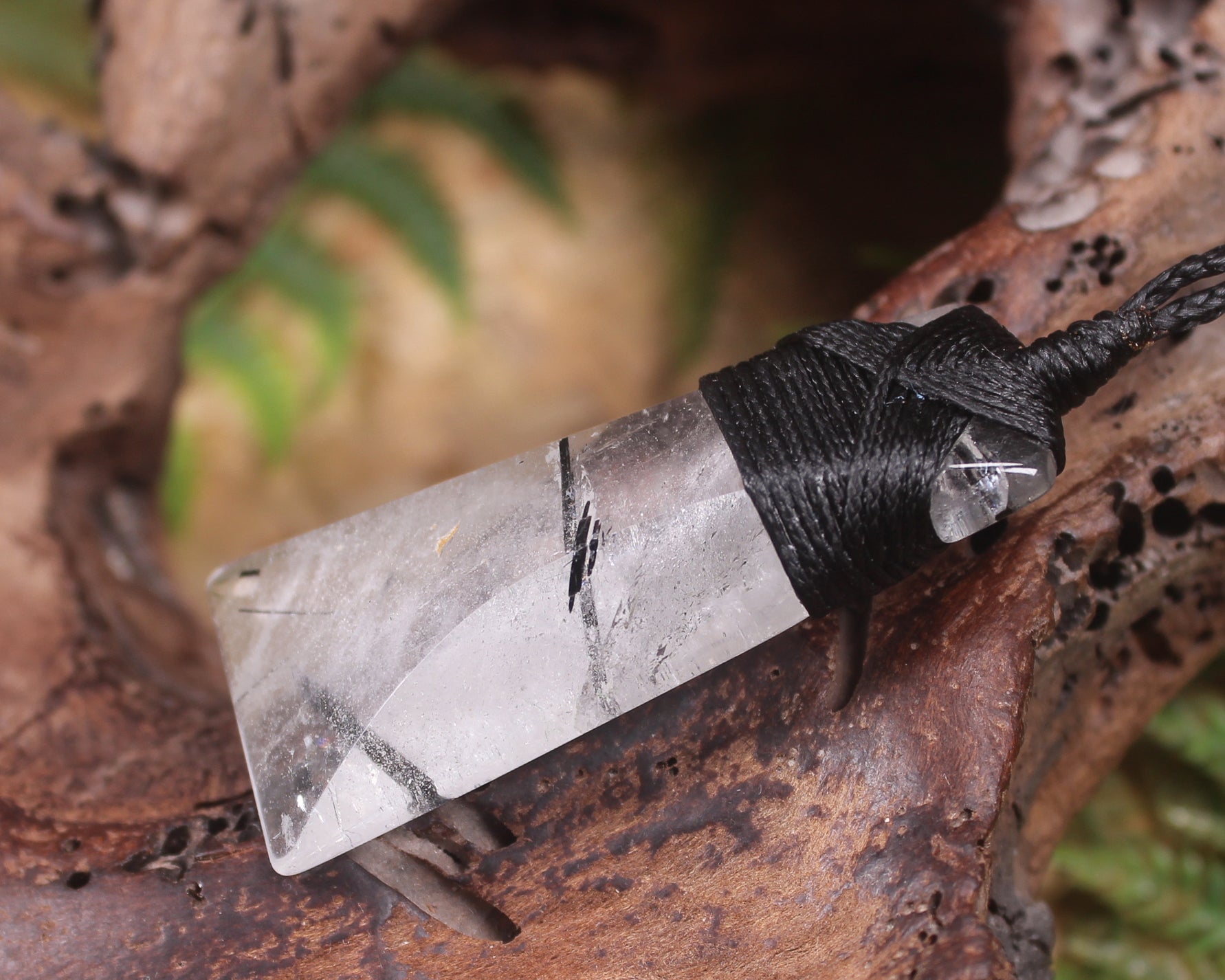 Quartz with Black Tourmaline carved into a Toki or Adze
