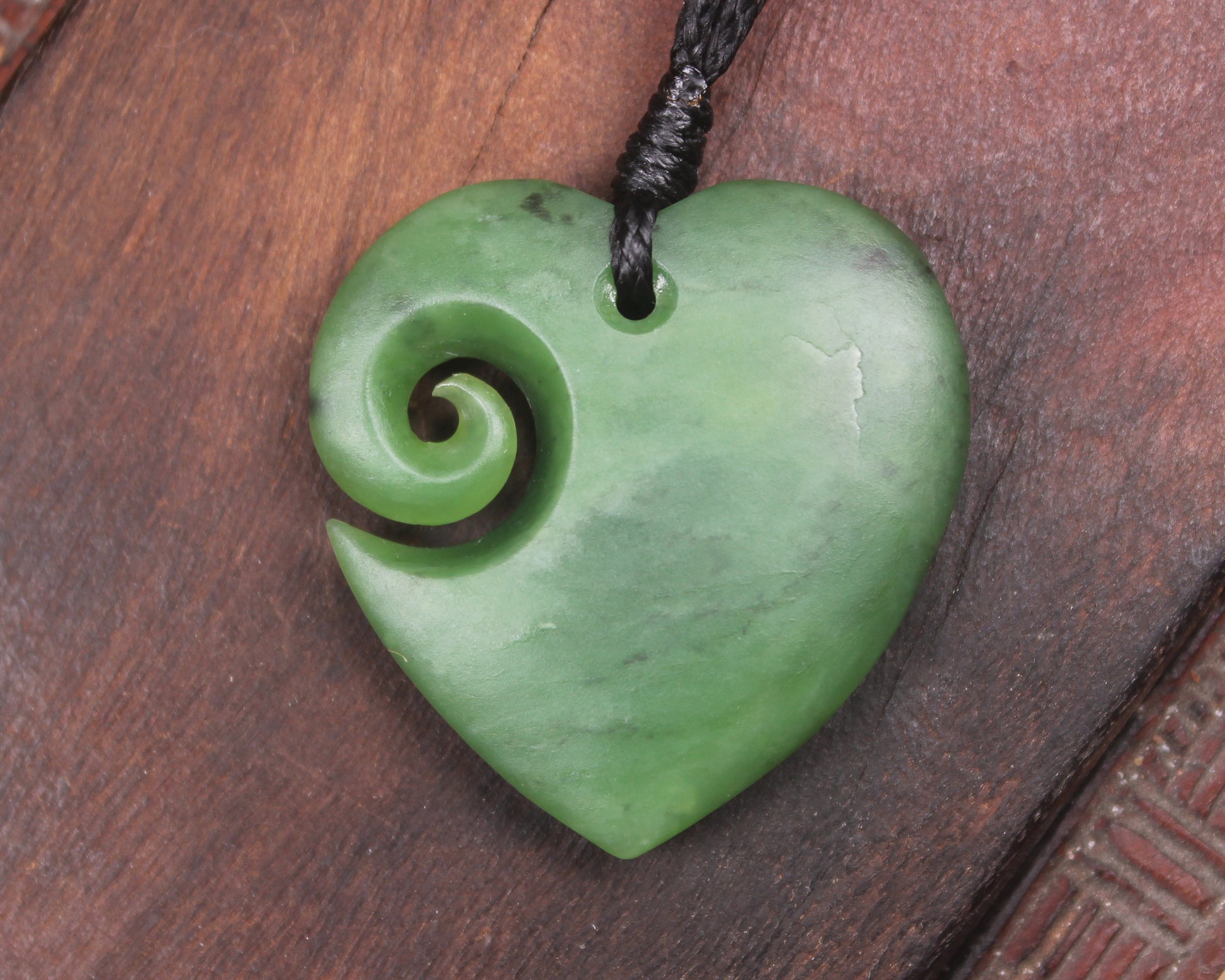 Koru Heart pendant carved from Hapopo Pounamu - NZ Greenstone