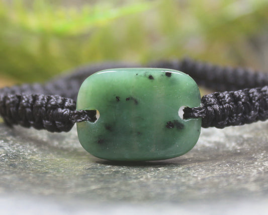 Adjustable cord bracelet with Hapopo Pounamu
