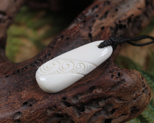 Roimata with Koru carved from beef bone