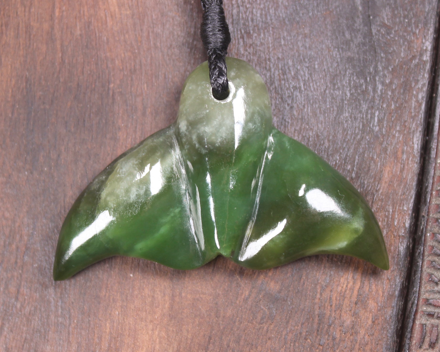 Whale tail carved from Hapopo Pounamu - NZ Greenstone