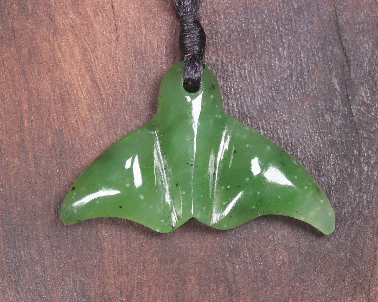 Whale tail carved from Hapopo Pounamu - NZ Greenstone