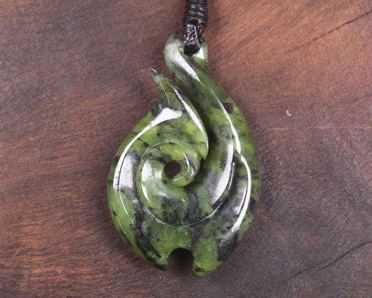 Douglas Creek pounamu hei matau pendant - NZ Greenstone