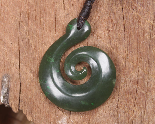 Koru pendant carved from Kawakawa Pounamu - NZ Greenstone